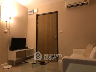 Cozy living room with modern furniture and air conditioning