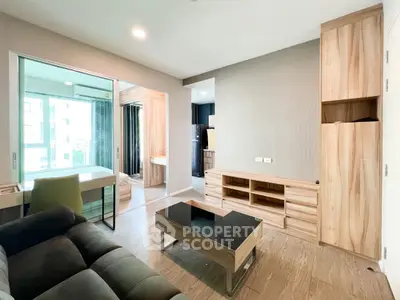 Modern living room with sleek wood furniture and natural light