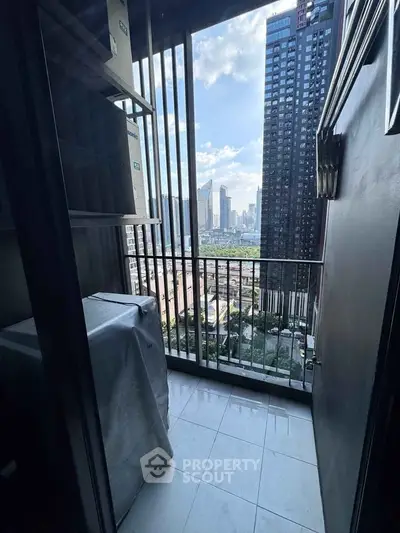 Urban balcony with city skyline view, perfect for enjoying the vibrant cityscape.