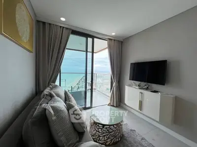 Modern living room with ocean view and stylish decor