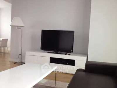 Modern living room with sleek TV setup and minimalist decor