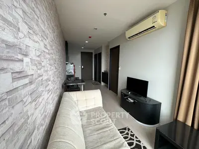 Modern living room with stylish decor and air conditioning in a contemporary apartment.
