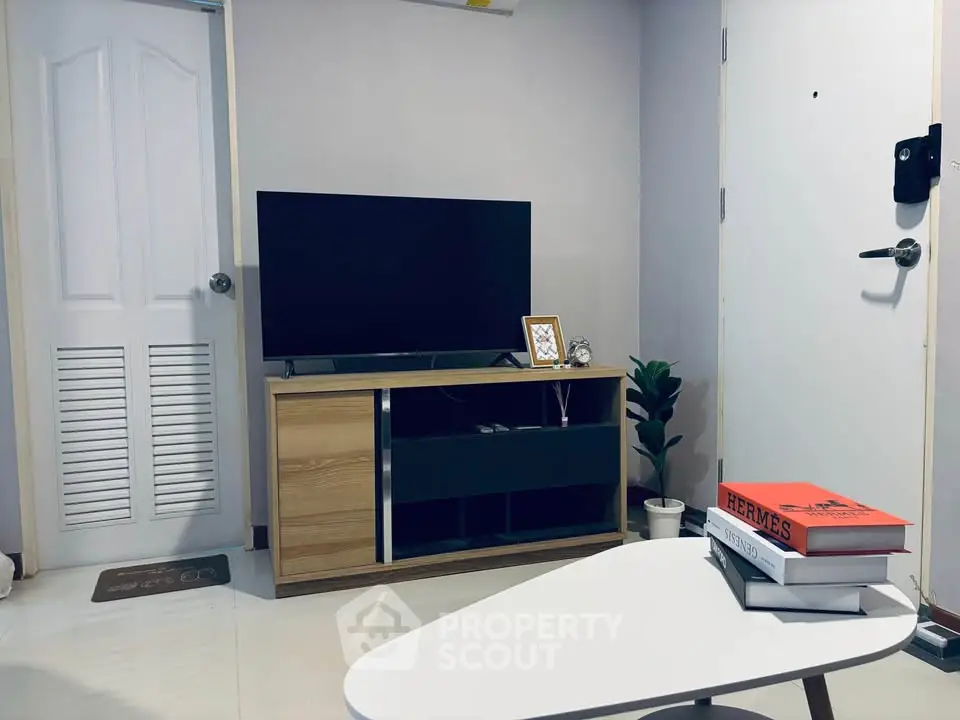 Modern living room with sleek TV stand and stylish decor