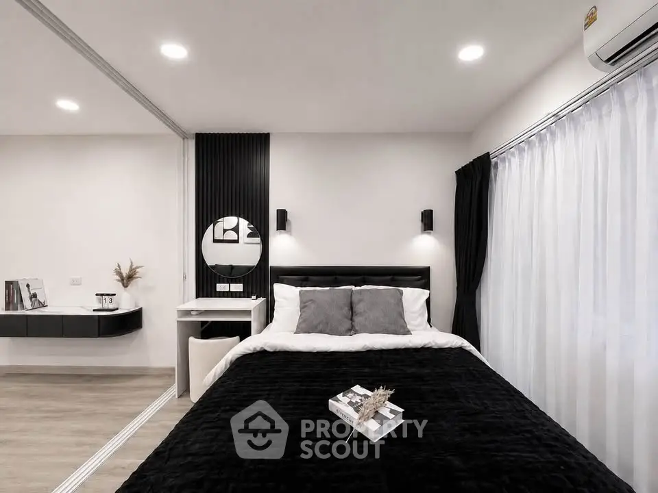 Modern bedroom with sleek design, featuring a cozy bed, stylish decor, and ambient lighting for a serene atmosphere.