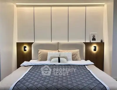 Luxurious modern bedroom with elegant lighting and stylish decor