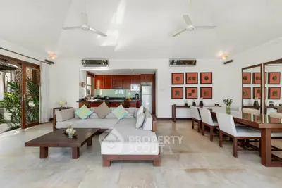 Spacious open-plan living room with modern furniture and elegant decor