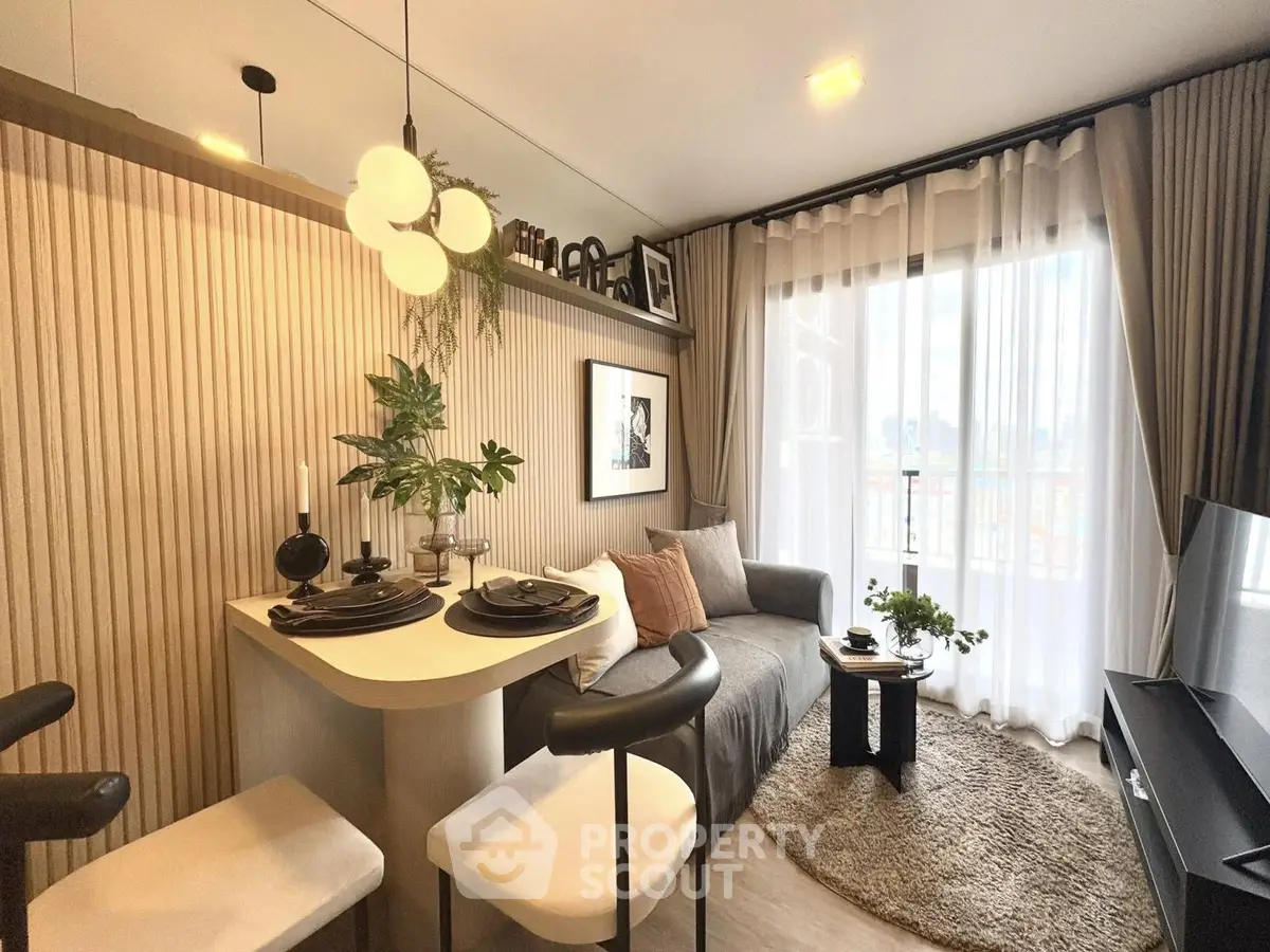 Stylish modern living room with cozy dining area and large window view