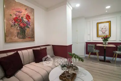 Chic living room with elegant decor, plush seating, and stylish artwork, perfect for modern urban living.