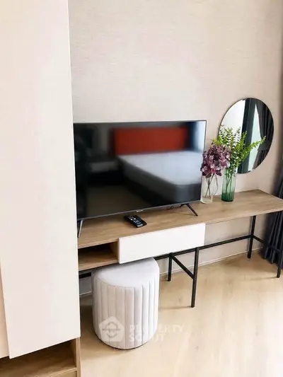 Modern living room with sleek TV setup and stylish decor