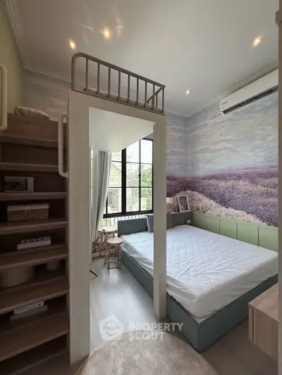 Charming bedroom with loft bed and scenic wall mural, featuring large window and modern decor.