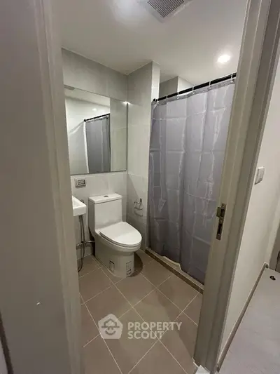 Modern bathroom with sleek design and shower curtain