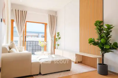 Bright and modern living room with large windows and stylish decor