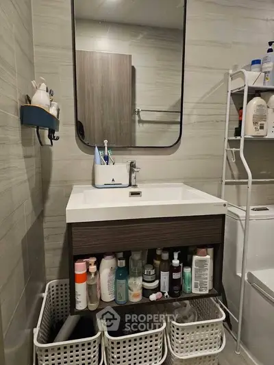 Modern bathroom with sleek vanity and ample storage space