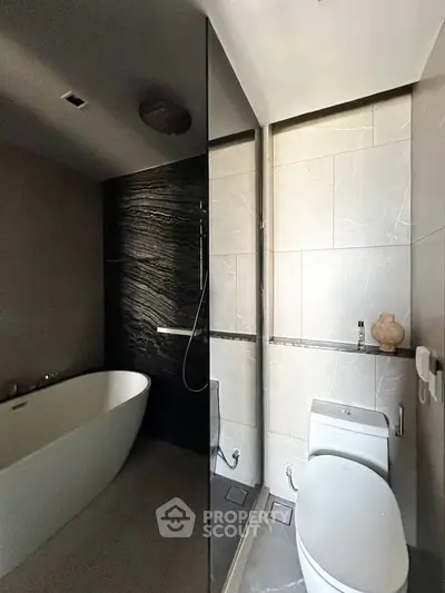 Luxurious modern bathroom with sleek design and freestanding bathtub