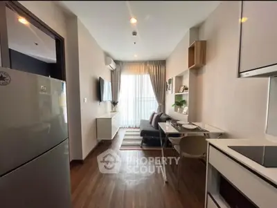 Modern apartment interior with sleek kitchen and cozy living area