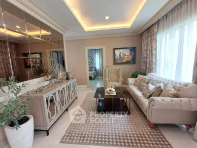 Elegant living room with plush seating and stylish decor in a modern home.