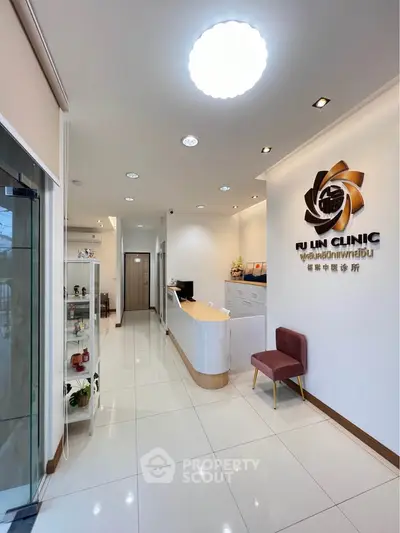 Modern clinic reception area with sleek design and bright lighting