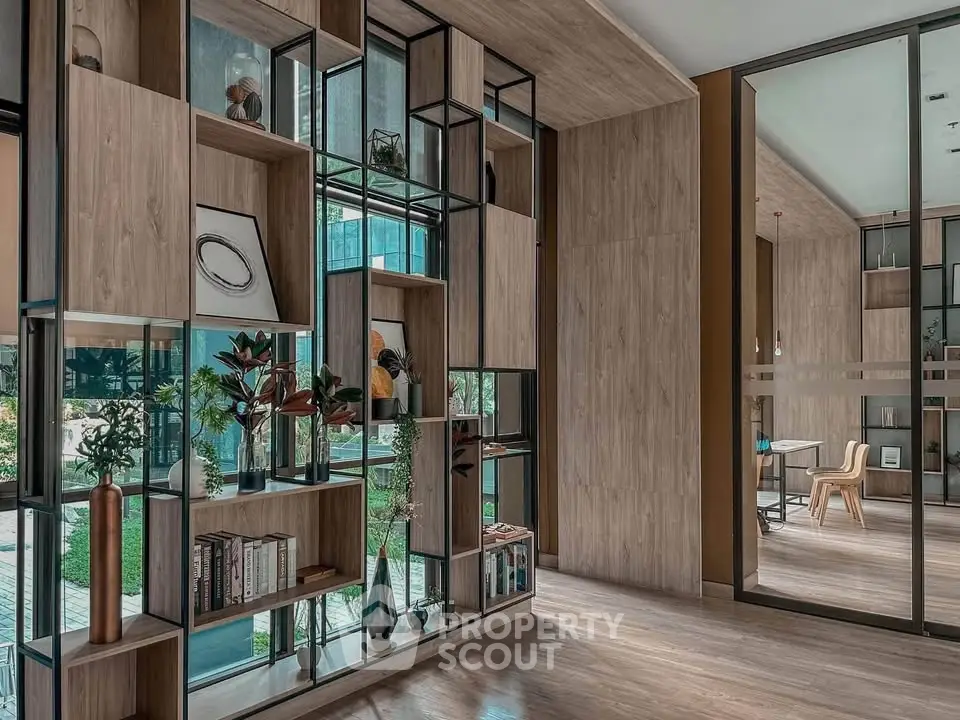 Modern interior with stylish shelving and wooden accents in a contemporary living space.