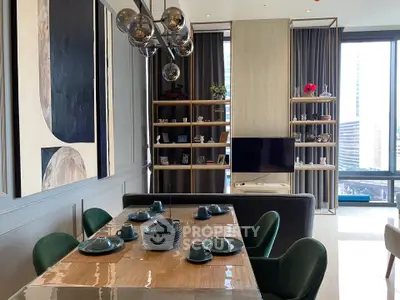 Modern living room with elegant dining area and stylish decor