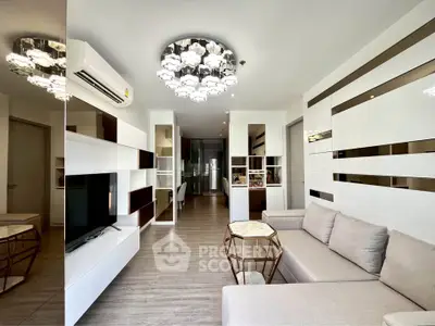Modern living room with stylish decor and elegant lighting