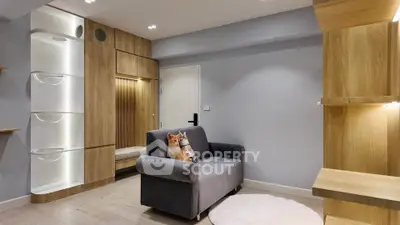 Modern living room with stylish wooden accents and cozy gray sofa