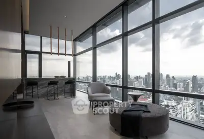 Luxurious high-rise living room with panoramic city views and modern furnishings.