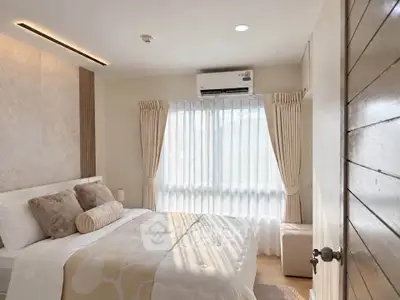Cozy and bright bedroom with elegant decor and natural light