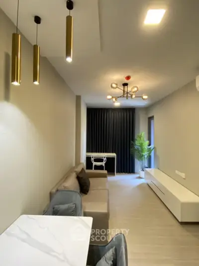 Modern living room with elegant lighting and minimalist decor