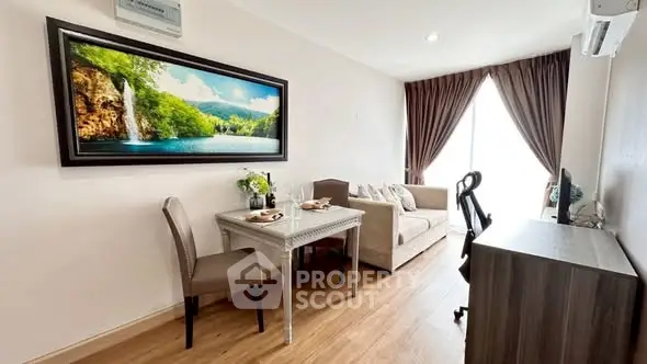 Cozy living room with elegant decor and natural light, featuring a comfortable sofa and stylish dining area.