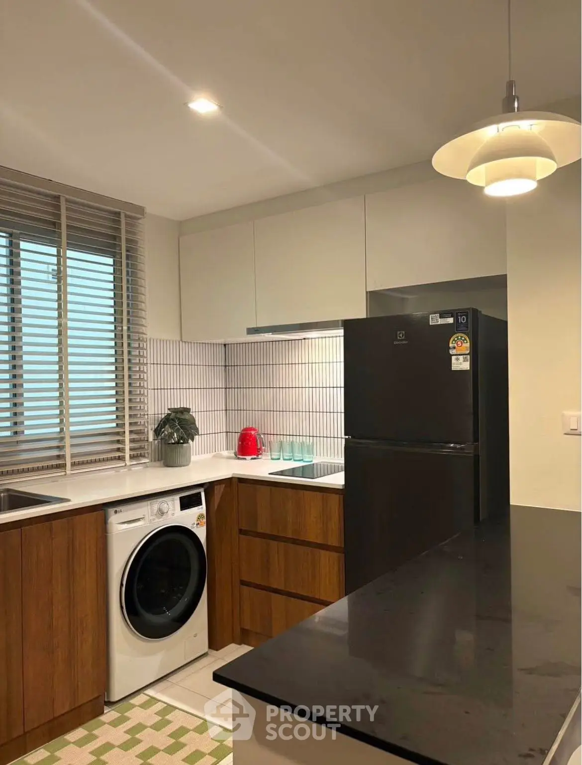 Modern kitchen with sleek appliances and stylish design