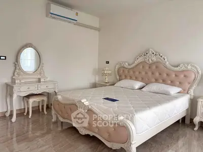Luxurious bedroom with elegant furniture and air conditioning