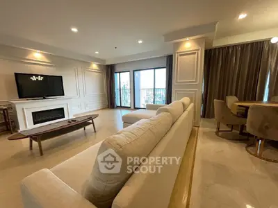 Spacious living room with modern decor and city view balcony