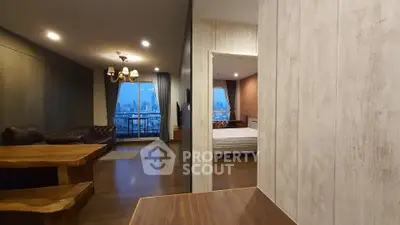 Spacious modern apartment with open living room and city view balcony