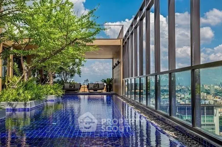 Luxurious rooftop pool with stunning city views and modern design.