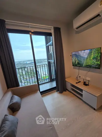 Modern living room with balcony view and sleek interior design