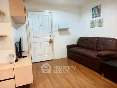 Cozy living room with leather sofa and modern decor