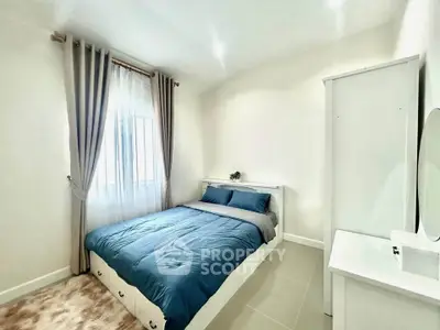 Cozy and bright bedroom with modern furnishings and natural light