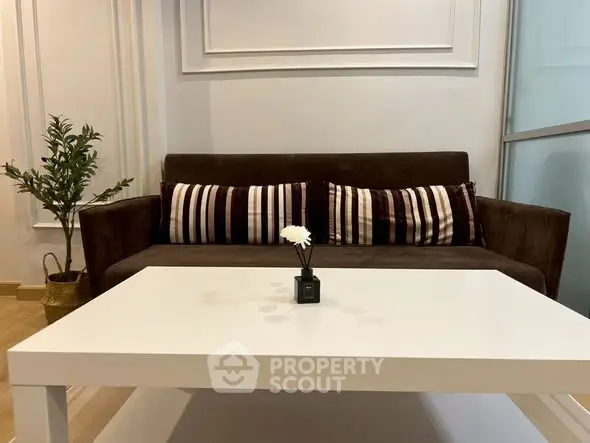 Cozy living room with modern sofa and stylish coffee table