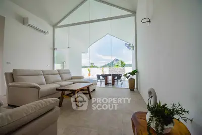 Spacious living room with stunning mountain view and modern furniture