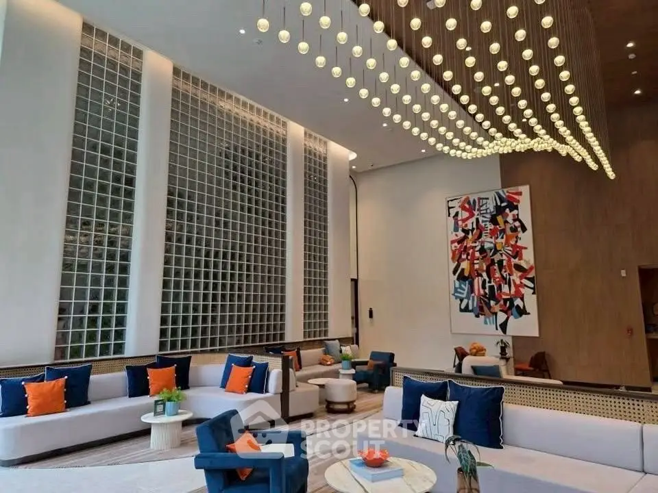 Luxurious modern living room with high ceilings and elegant lighting