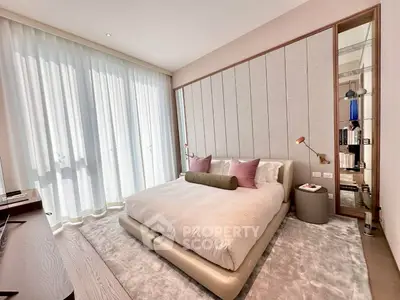 Luxurious bedroom with modern design, plush bedding, and elegant decor, perfect for relaxation and comfort.