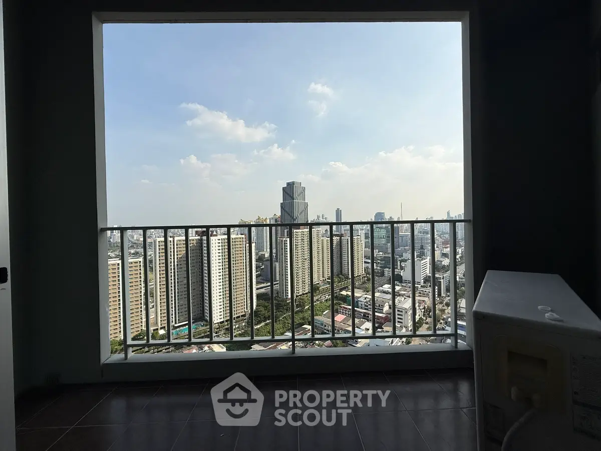 Stunning cityscape view from high-rise balcony with modern skyline