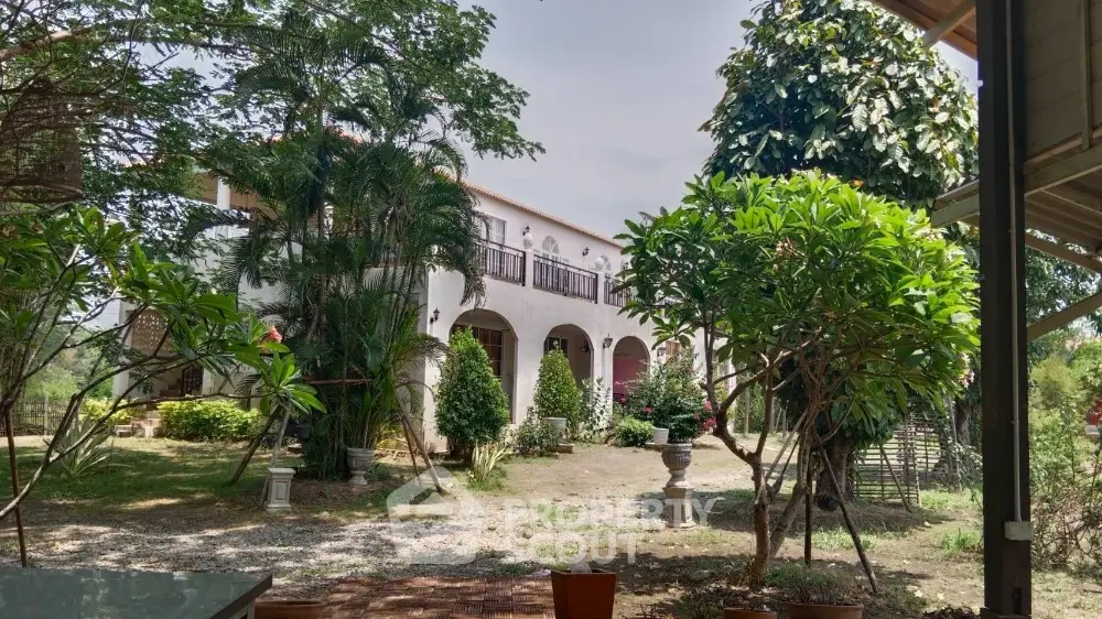 Charming villa surrounded by lush greenery and spacious garden