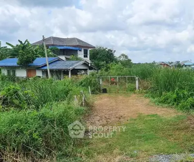 Charming rural property with lush greenery and a spacious yard, perfect for nature lovers.