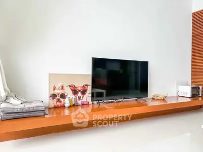 Modern living room with sleek TV setup and stylish decor