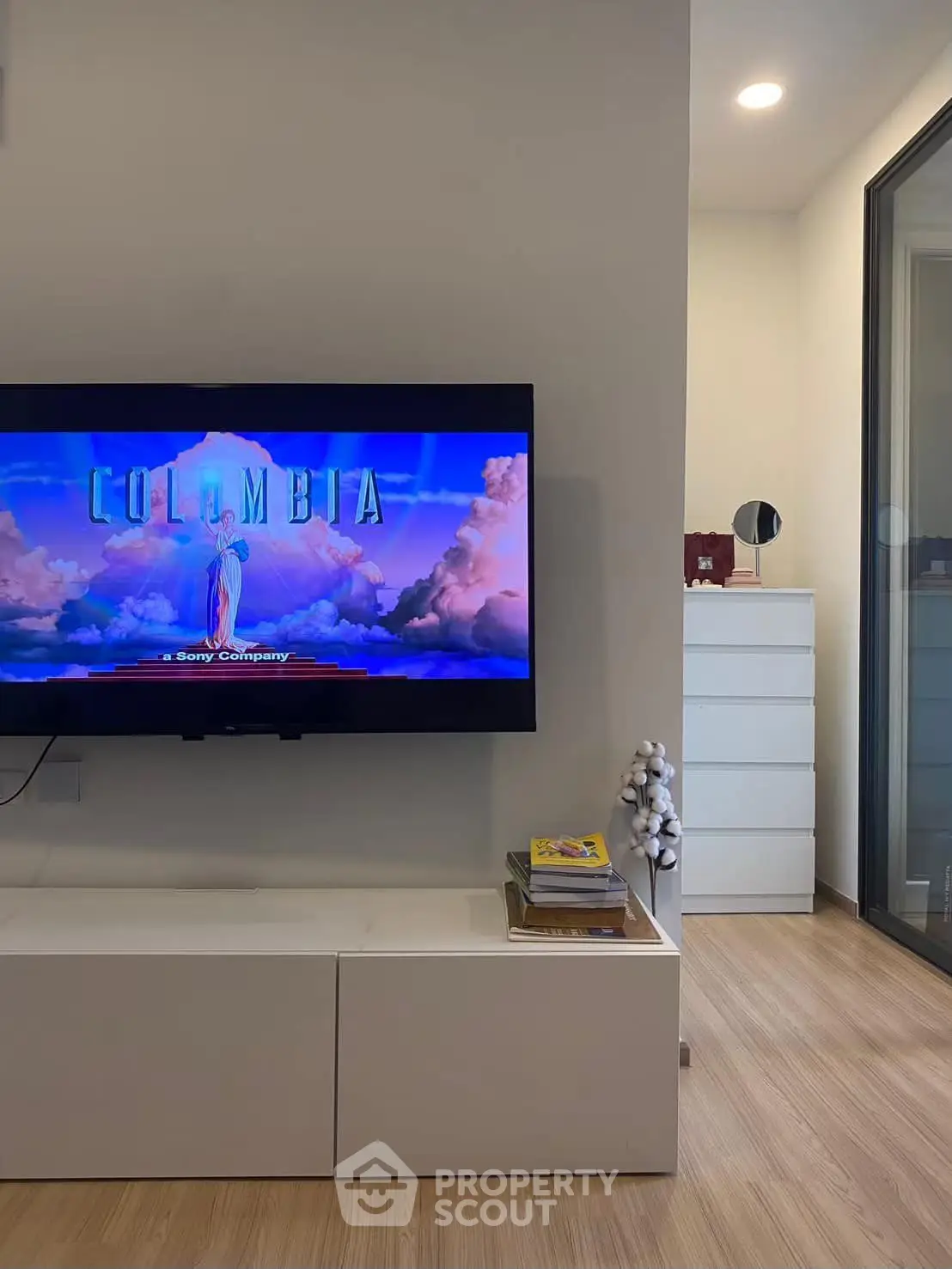 Modern living room with sleek TV setup and stylish decor