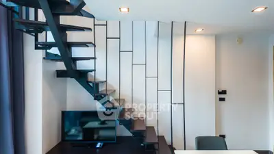 Modern interior with stylish staircase and sleek design elements