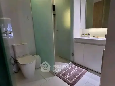 Modern bathroom with sleek design and glass shower enclosure