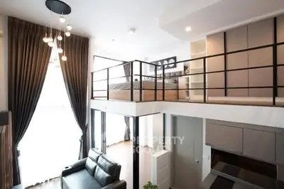 Modern loft apartment with high ceilings and stylish interior design