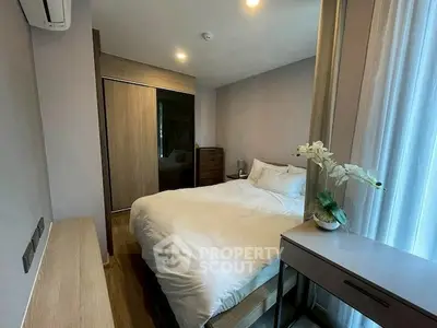 Cozy modern bedroom with elegant decor and natural light